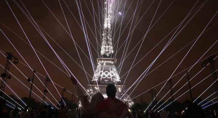 Eiffel Tower illuminated for the Paris 2024 Opening Ceremony