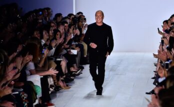 Michael Kors on the catwalk od his Spring Summer 2014 collection