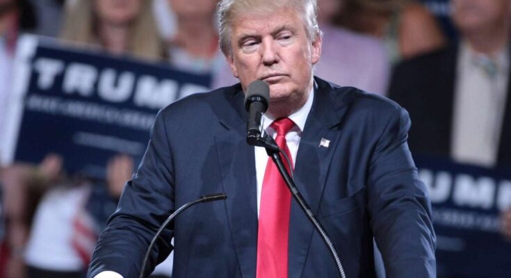 Donald Trump speaking with supporters at a campaign rally at Veterans Memorial Coliseum in Phoenix, Arizona