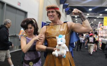 two adults cosplaying at a convention