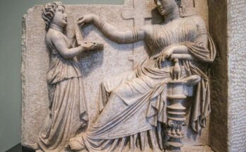 Gravestone of a Greek high status woman master being taken care of by her slave attendant.