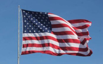 American flag waving on a flag pole