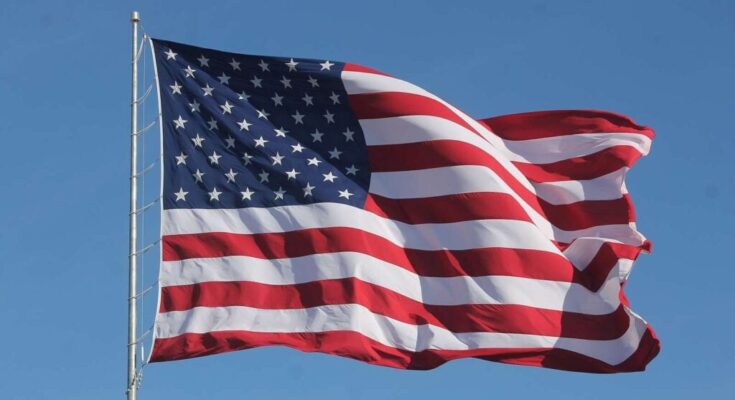 American flag waving on a flag pole