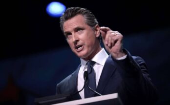 Governor Gavin Newsom speaking with attendees