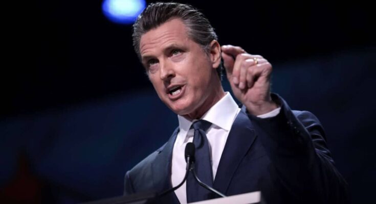 Governor Gavin Newsom speaking with attendees