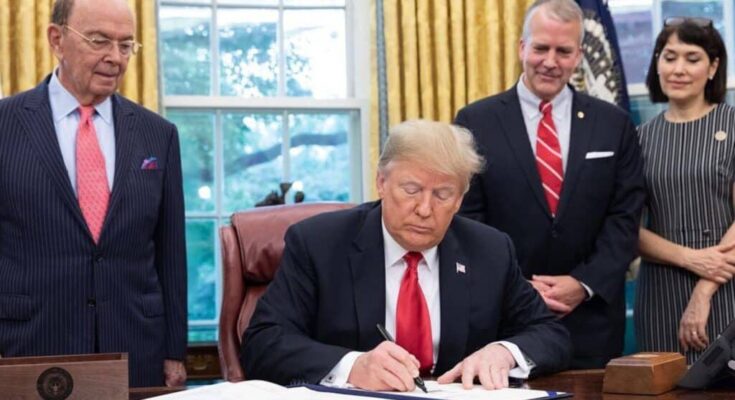 Trump signing the SOS act