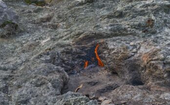 Flames rise from the cracks of Yanartaş, the burning mountain, in Olympos Beydagları National Park, Turkey